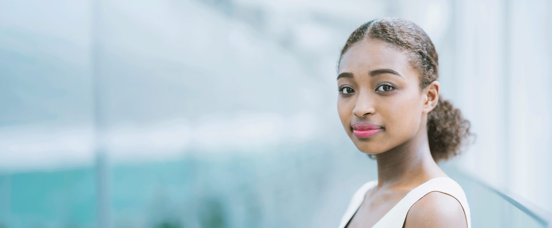 confident young woman looking at the camera