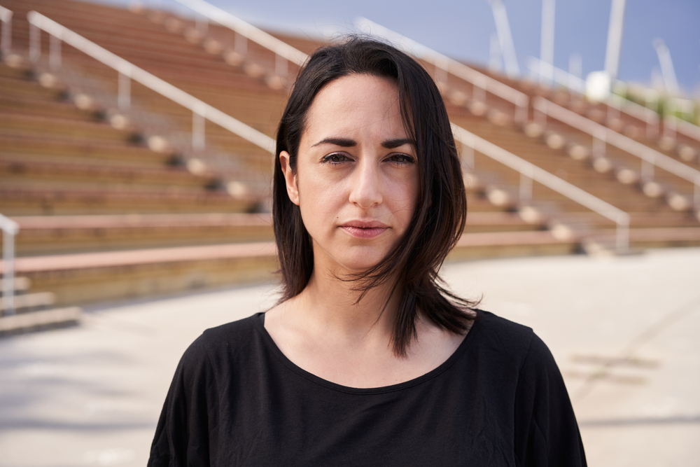 contemplative woman looking at the camera